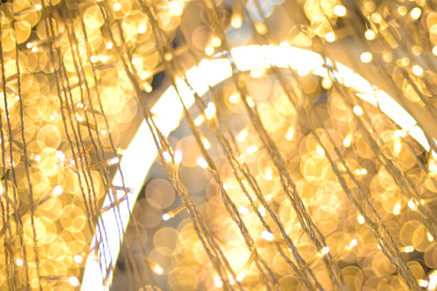istock LED light on Christmas tree with bokeh blur for Christmas and new year day 887249454