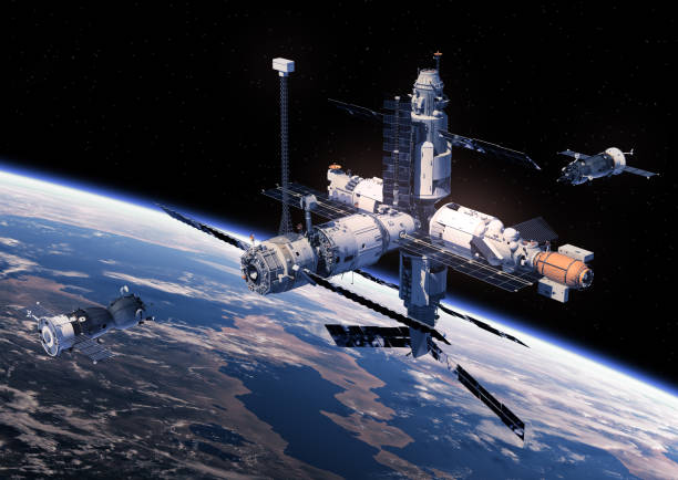 istock Two Spacecraft Is Preparing To Dock With Space Station 887249958