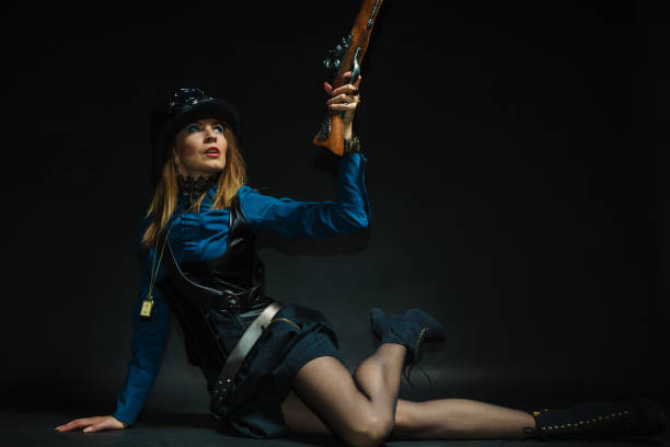 istock Steampunk girl armed and dangerous. 887262674