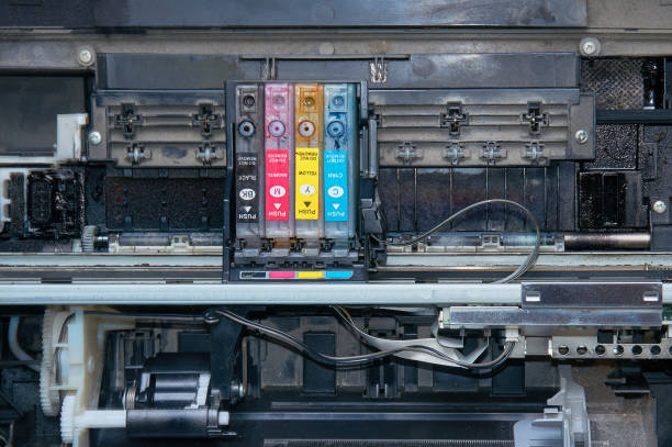 istock Old, dirty, disassembled ink jet printer. View of internal parts. 887263162