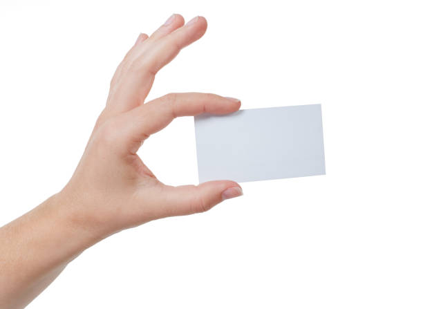 istock Left hand delicately holds blank business card 887265568