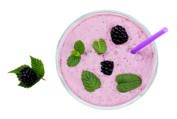 istock Healthy blackberries yogurt with fresh berries isolated on white background. Top view. 887266956