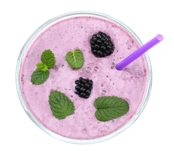 istock Healthy blackberries yogurt with fresh berries isolated on white background. Top view. 887267044