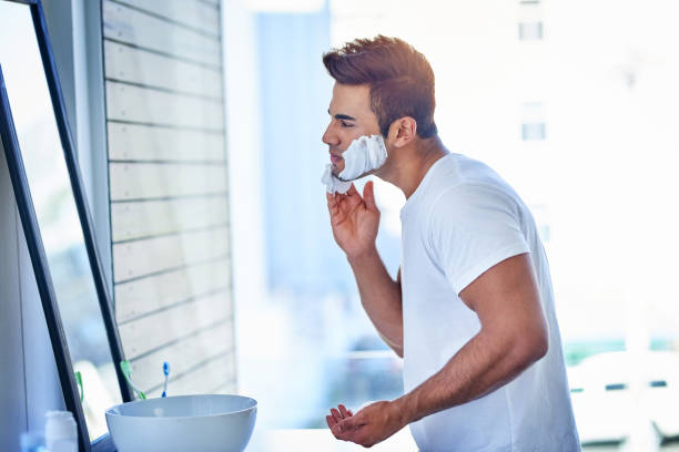 taking it all off - shaving men shaving cream mirror imagens e fotografias de stock