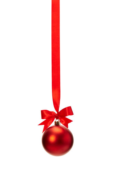 istock red christmas ball hanging on ribbon with bow 887275726