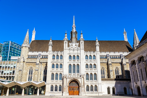 Exterior of Guildhall in the City of London, England against a cloudless sky