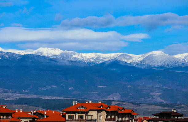 istock Mountain snow peak, Alpine village houses. 887288092