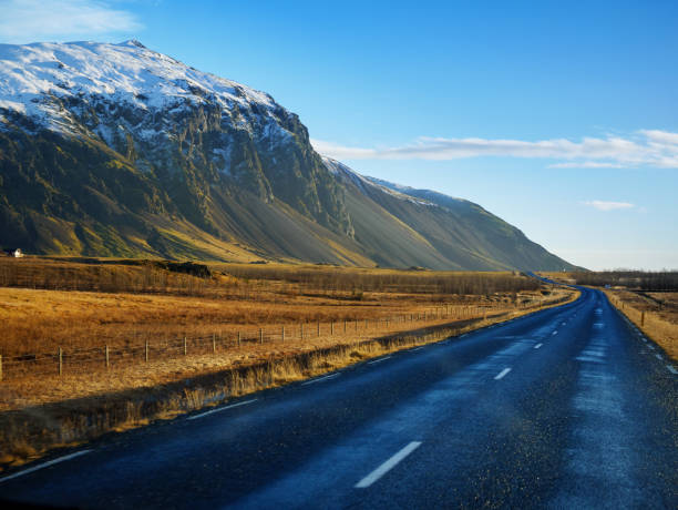 Curve raod to the mountain with motion blur, Iceland stock photo
