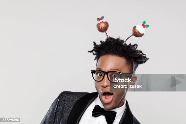 Funny Portrait Of Excited Elegant Man Wearing Christmas Headband Stock Photo - Download Image Now