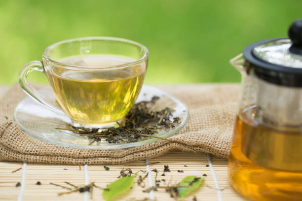 istock cup of tea and teapot on wooden table 887295212
