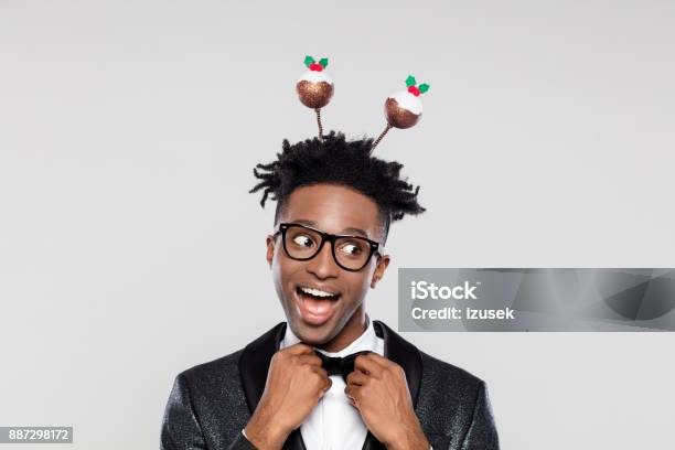 Funny Portrait Of Excited Elegant Man Wearing Christmas Headband Stock Photo - Download Image Now
