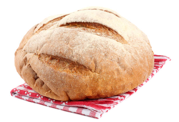 istock freshly baked bread on red cloth isolated on white background 887298838