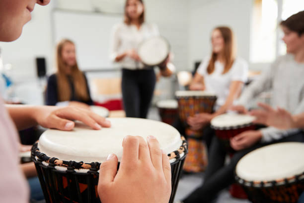 istock Teenage Students Studying Percussion In Music Class 887302672