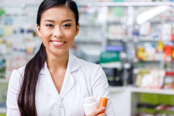 istock pharmacist with medication in drugstore 887303434