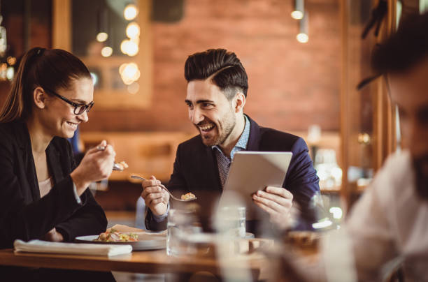 istock Business People Discussing Work at Cafe Restaurant 887307042