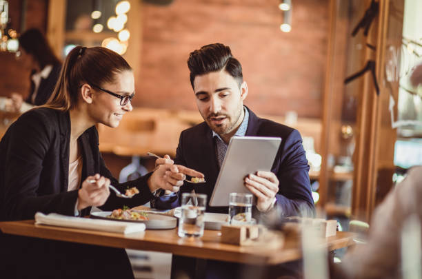 istock Business People Discussing Work at Cafe Restaurant 887307238