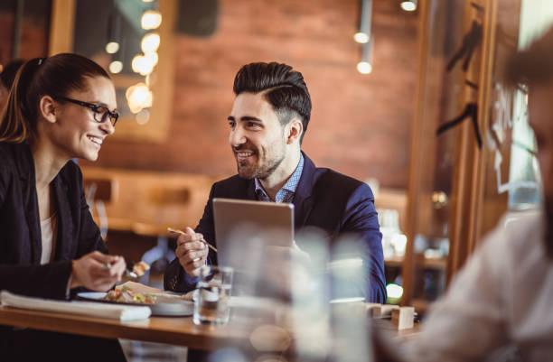 istock Business People Discussing Work at Cafe Restaurant 887307528