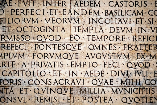 Inscripción en latín en la pared exterior de la pared del Ara Pacis en Roma, Italia photo