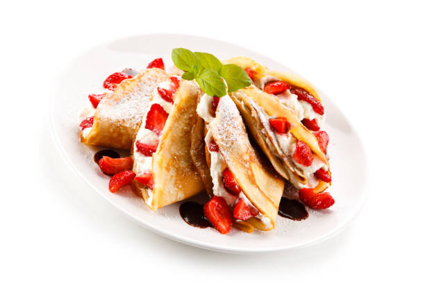istock Crepes with strawberries and cream 887312410