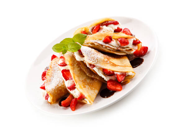 istock Crepes with strawberries and cream 887312474