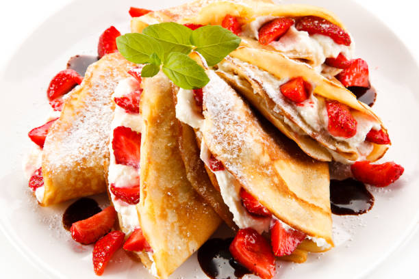 istock Crepes with strawberries and cream 887312718