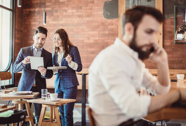 istock Business People Discussing Work at Cafe Restaurant 887312748