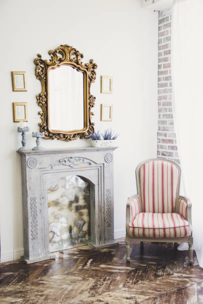 istock striped chair near the fireplace 887322584