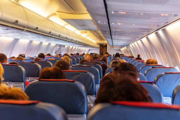 interior de avión - airplane passenger indoors inside of fotografías e imágenes de stock