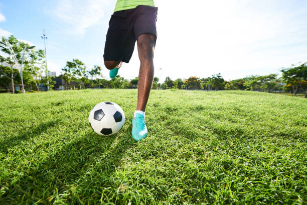 istock Kicking Soccerball on Field 887327516