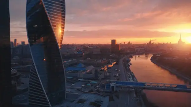 Flying over Moscow International City Business Center at sunrise
