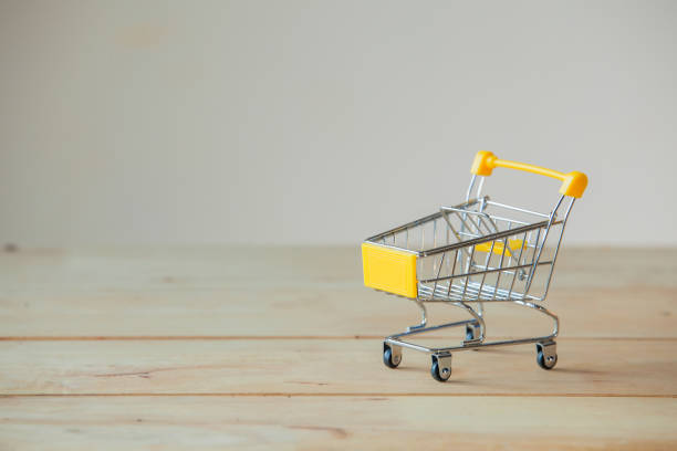 istock Small Shopping Cart On Laptop With Copyspace : Online Shopping Concept. E-commerce. 887361390