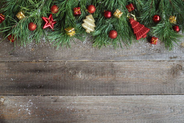 istock Christmas card on wooden background 887362398