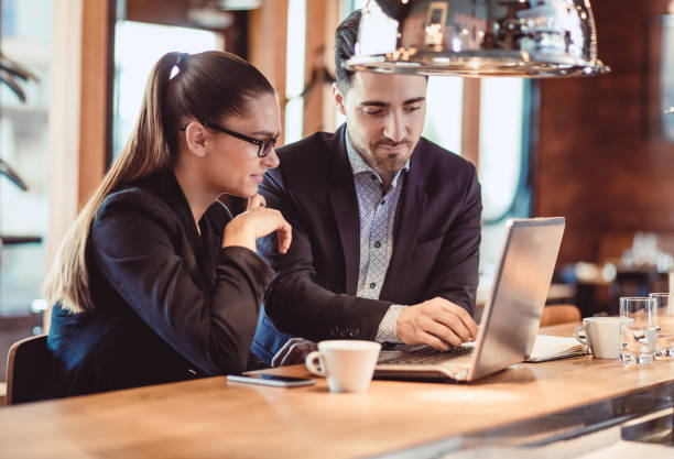 istock Business People Discussing Work at Cafe Restaurant 887362992