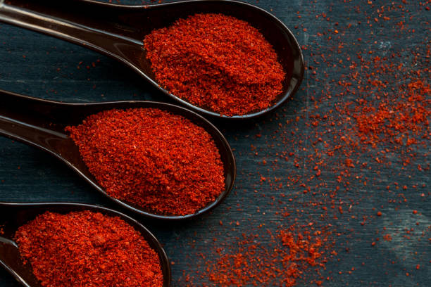 istock Studio shot of three spoons with paprika powder 887372246