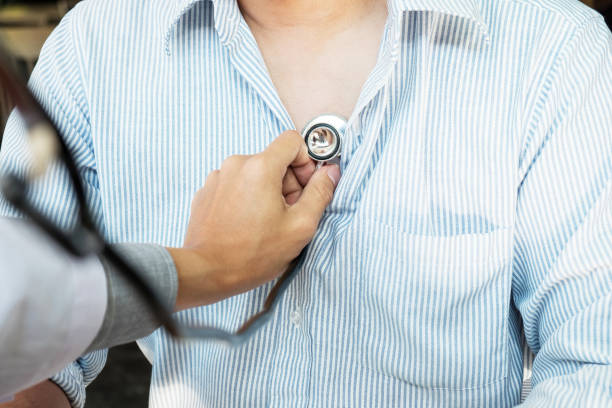 istock Doctor Examining Patient With Stethoscope At Clinic 887372832