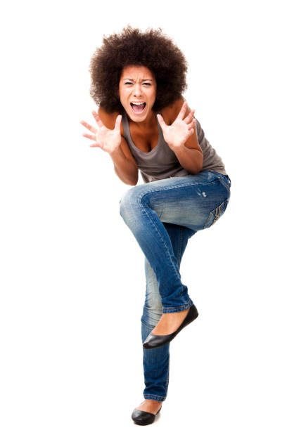 Woman in Panic Horrified young woman in panic yelling, isolated on white women screaming surprise fear stock pictures, royalty-free photos & images