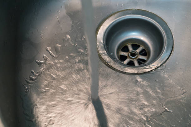 istock Tap water running in a clean sink 887384052