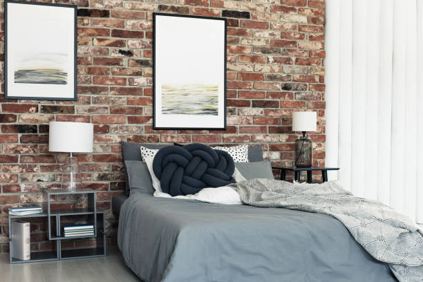 istock Lamps and posters in bedroom 887388632