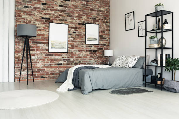 Posters in grey bedroom