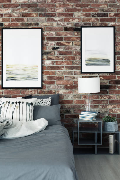 istock Paintings in modern bedroom interior 887388664