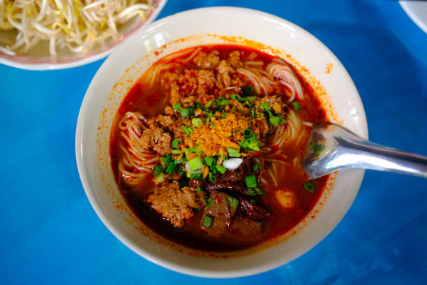 istock Northern Thai food (Kanom Jeen Nam Ngeaw) with vegetables 887394824