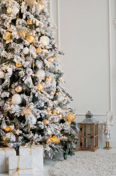 istock Christmas tree decorated with golden balls 887395434
