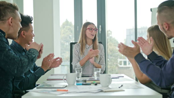 istock High Fives Members at a Startup in a Modern Office 887408076