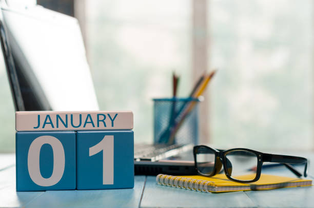 January 1st. Day 1 of month, calendar on teacher workplace background. Winter time. Empty space for text January 1st. Day 1 of month, calendar on teacher workplace background. Winter time. Empty space for text. new years day photos stock pictures, royalty-free photos & images