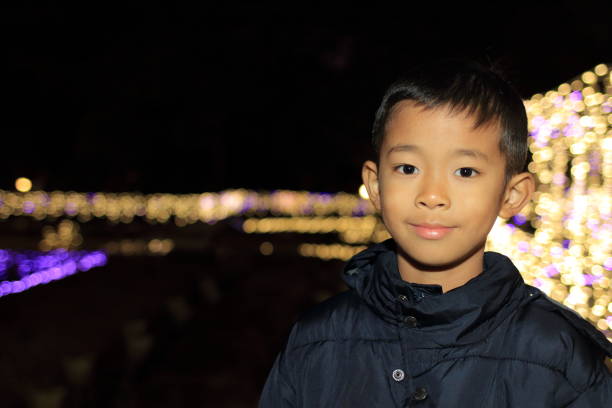 Christmas illumination and Japanese boy (second grade at elementary school)