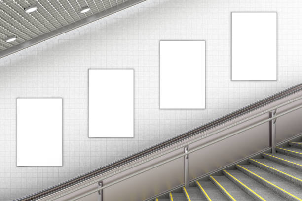пустой рекламный плакат на подземной стене эскалатора - sign station contemporary escalator стоковые фото и изображения