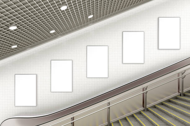 istock Blank advertising poster on underground escalator wall 887411900