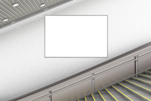 istock Blank advertising poster on underground escalator wall 887412618