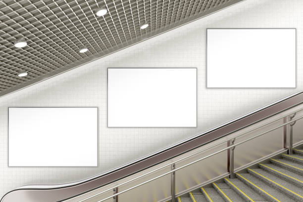 istock Blank advertising poster on underground escalator wall 887412778