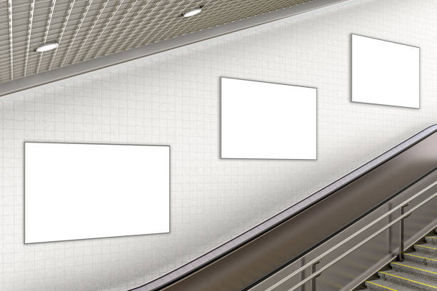istock Blank advertising poster on underground escalator wall 887413012